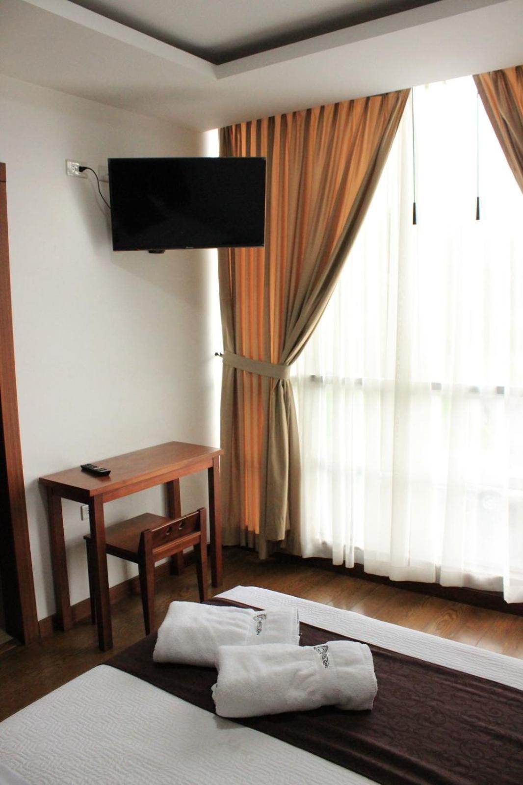 Hostal Camil Loja Rum bild